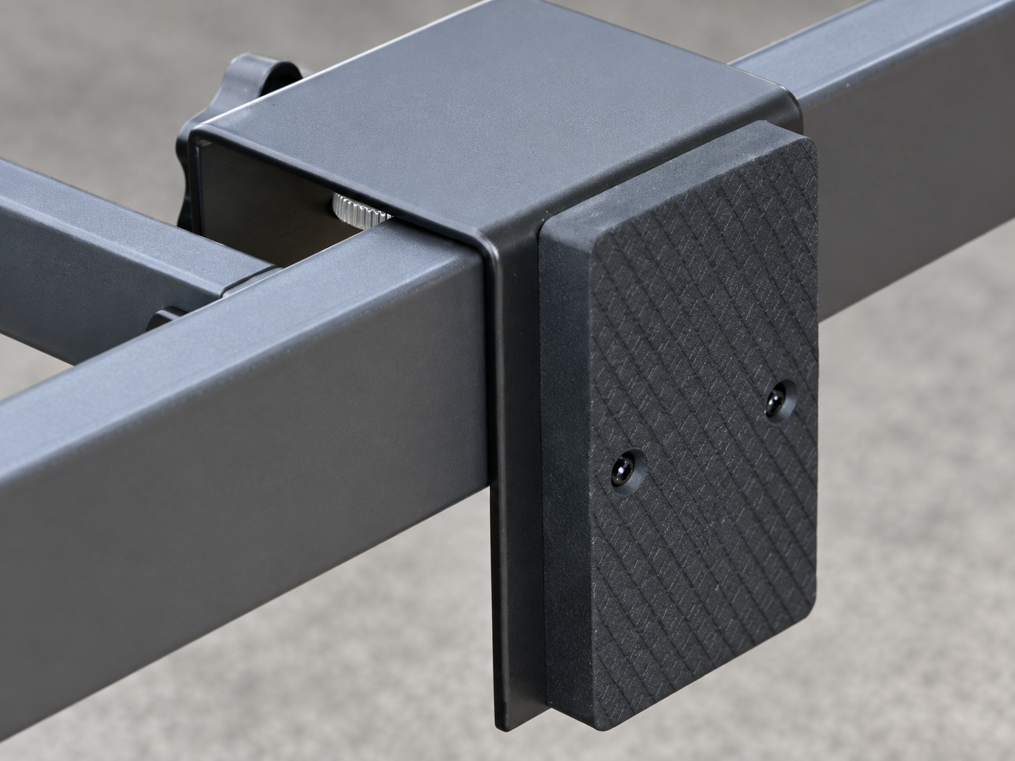 Platform mount installed on a rectangular steel rail
