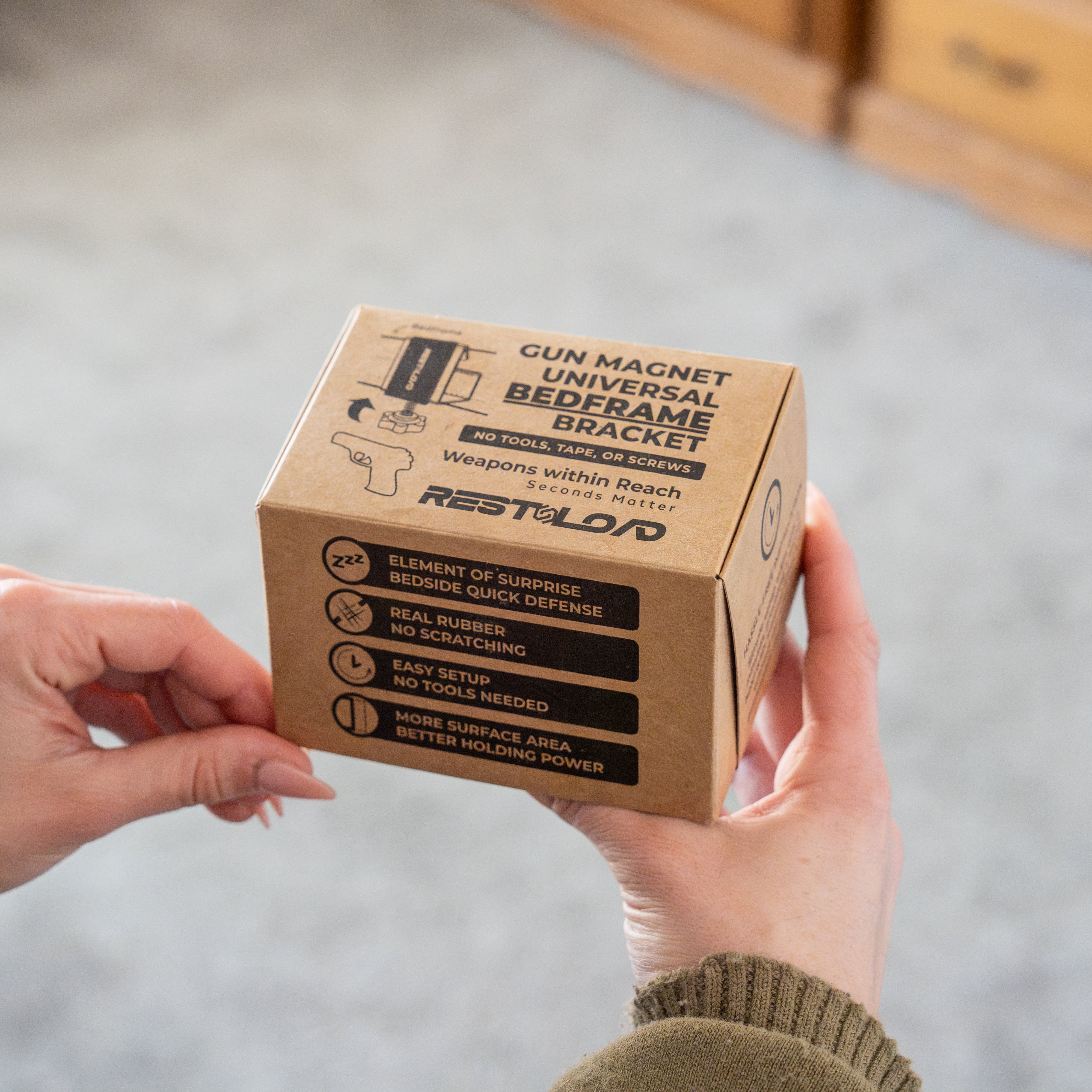 RESTNLOAD product packaging held in a hand